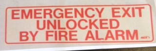 SIGN - 8&quot; X 4&quot;  ADHESIVE BACK &quot;EMERGENCY EXIT UNLOCKED BY